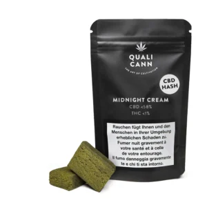 Qualicann CBD Hash Midnight Cream mit Haschstücken vor Verpackung